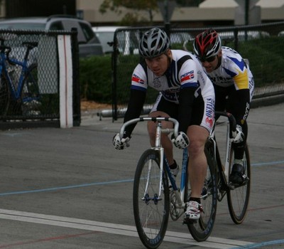 Chris Ray and Gary Jackson race for 3rd in A grade