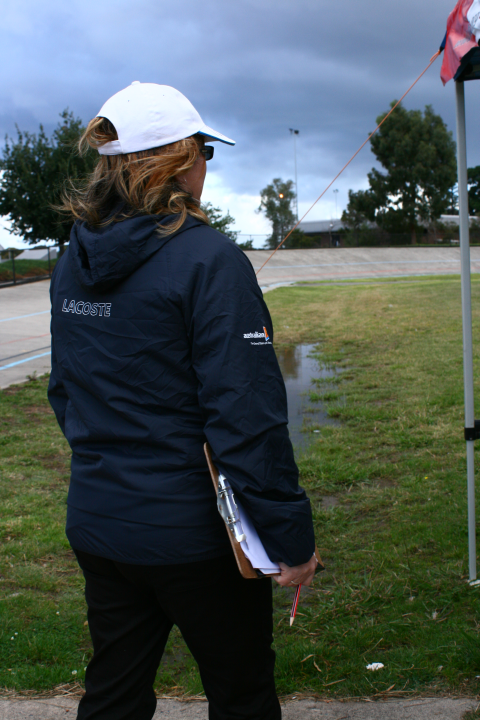 Chief Comm watches a race