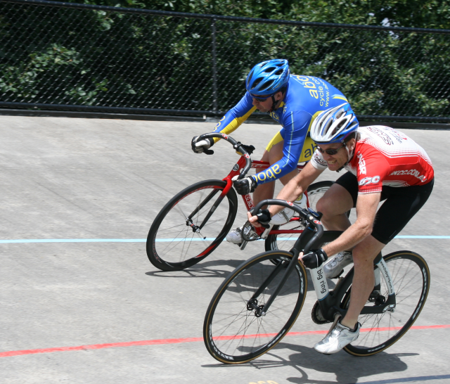 Aaron and Carl come out of turn 4